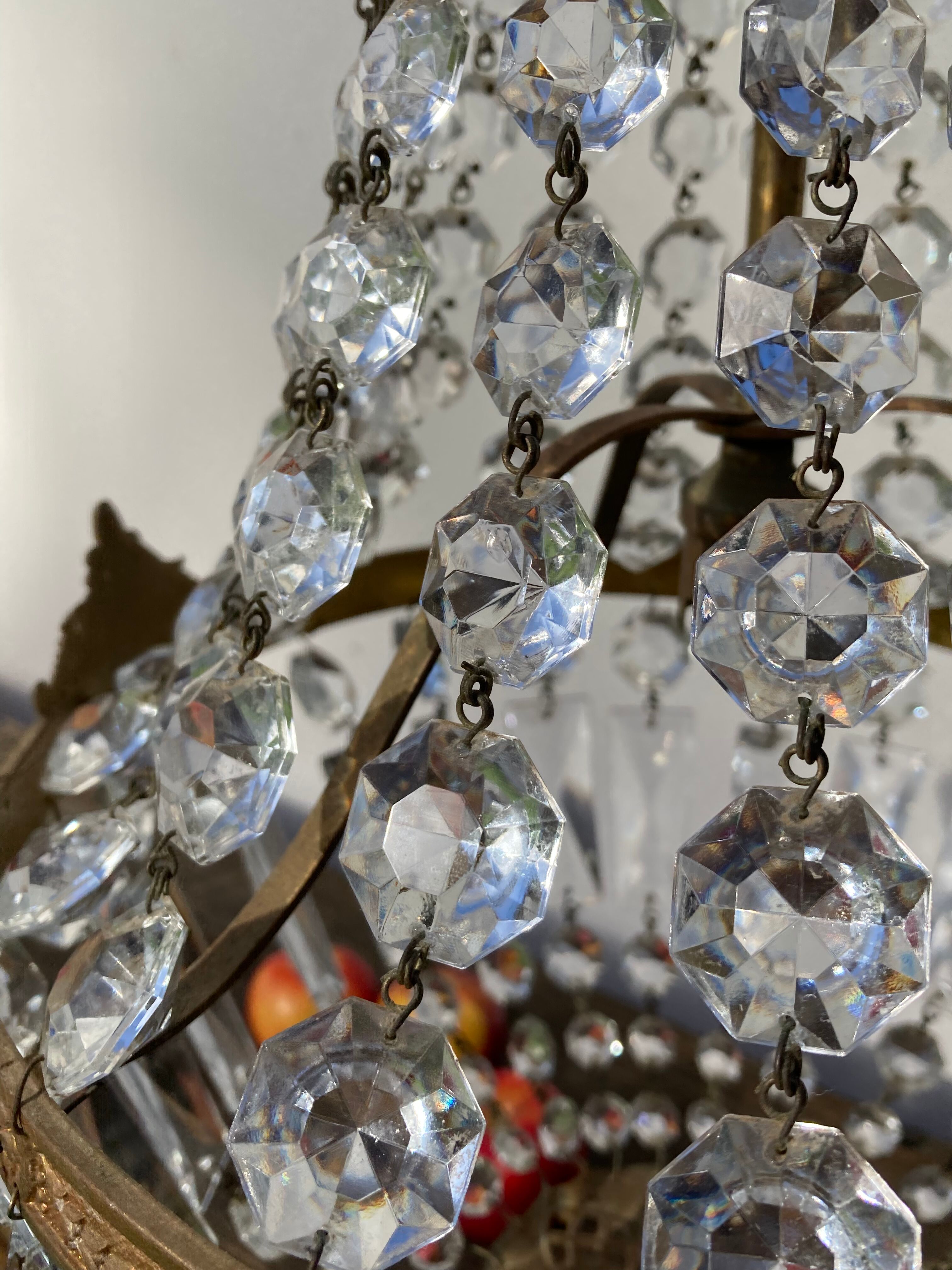Balloon chandelier with glass crystal and brass tassels in empire style