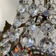Balloon chandelier with glass crystal and brass tassels in empire style