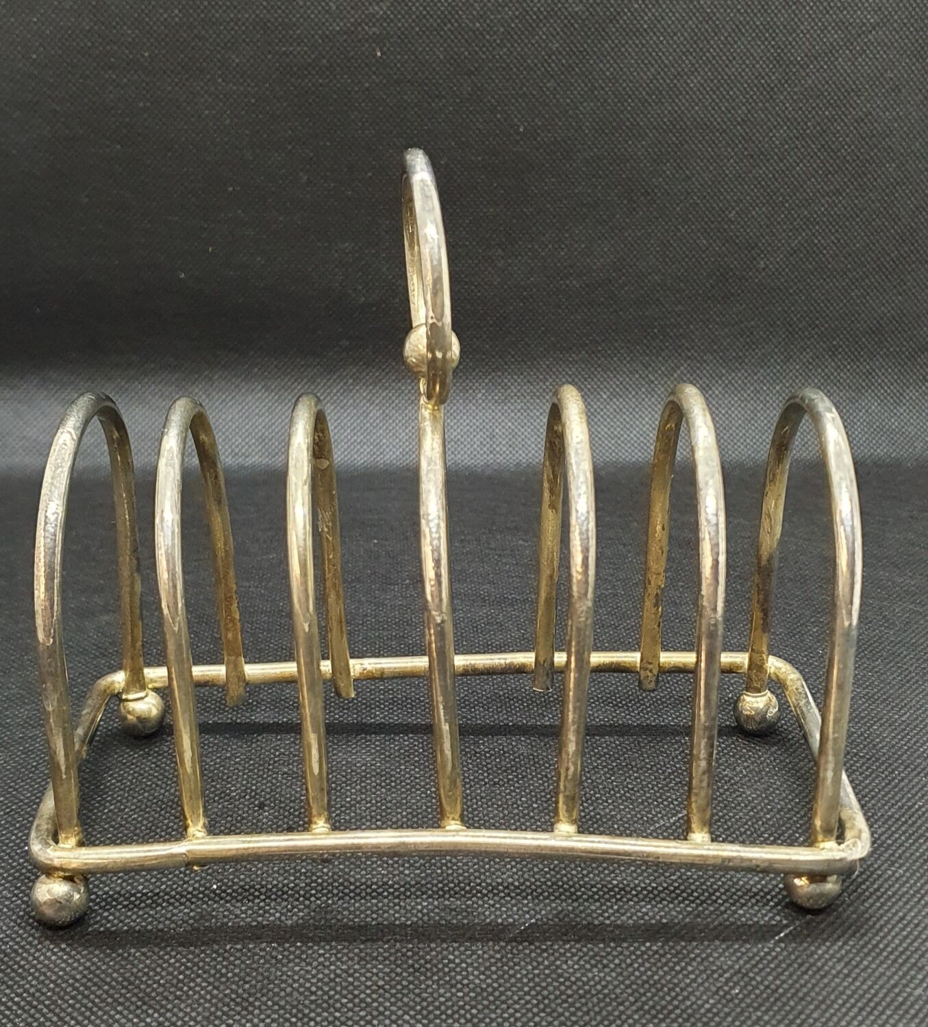Toast holder in silver metal