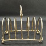 Toast holder in silver metal