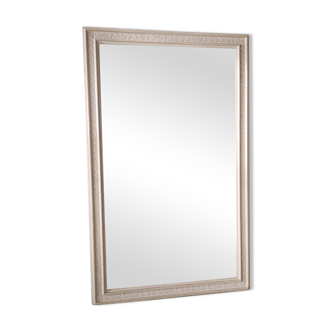 Beveled mirror in white lacquered wood decorated with oak leaf friezes h:1m74