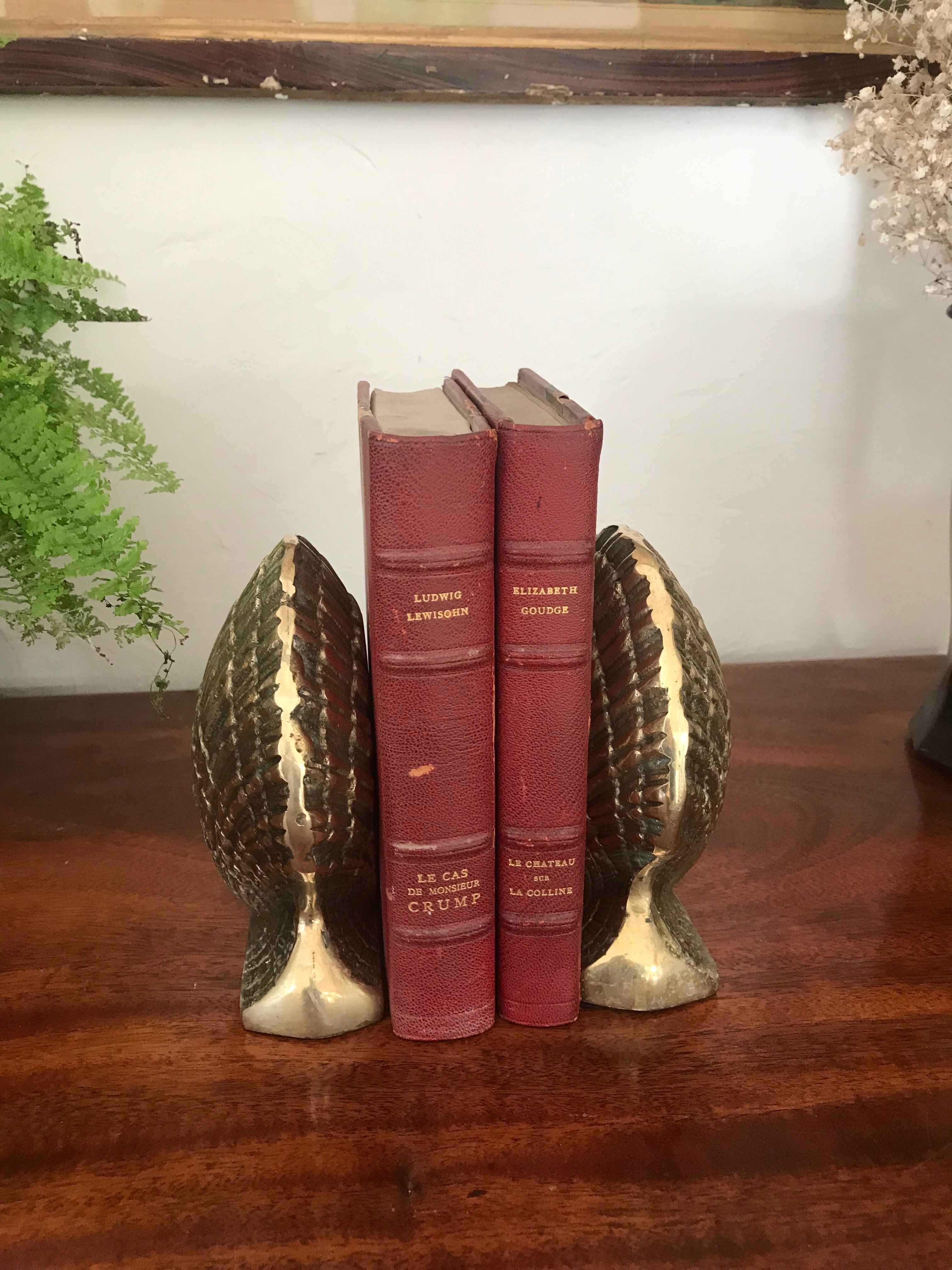 Pair of brass shell book clamps