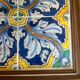 Panel of four Catalan tiles, 17th century, framed.
