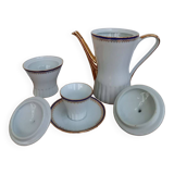 Coffee pot, sugar pot, 1 cup and saucer.