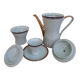 Coffee pot, sugar pot, 1 cup and saucer.