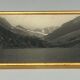 Photo in black and white mountain lake in golden frame