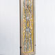 Rectangular Indonesian construction element with blue and yellow plant in carved wood