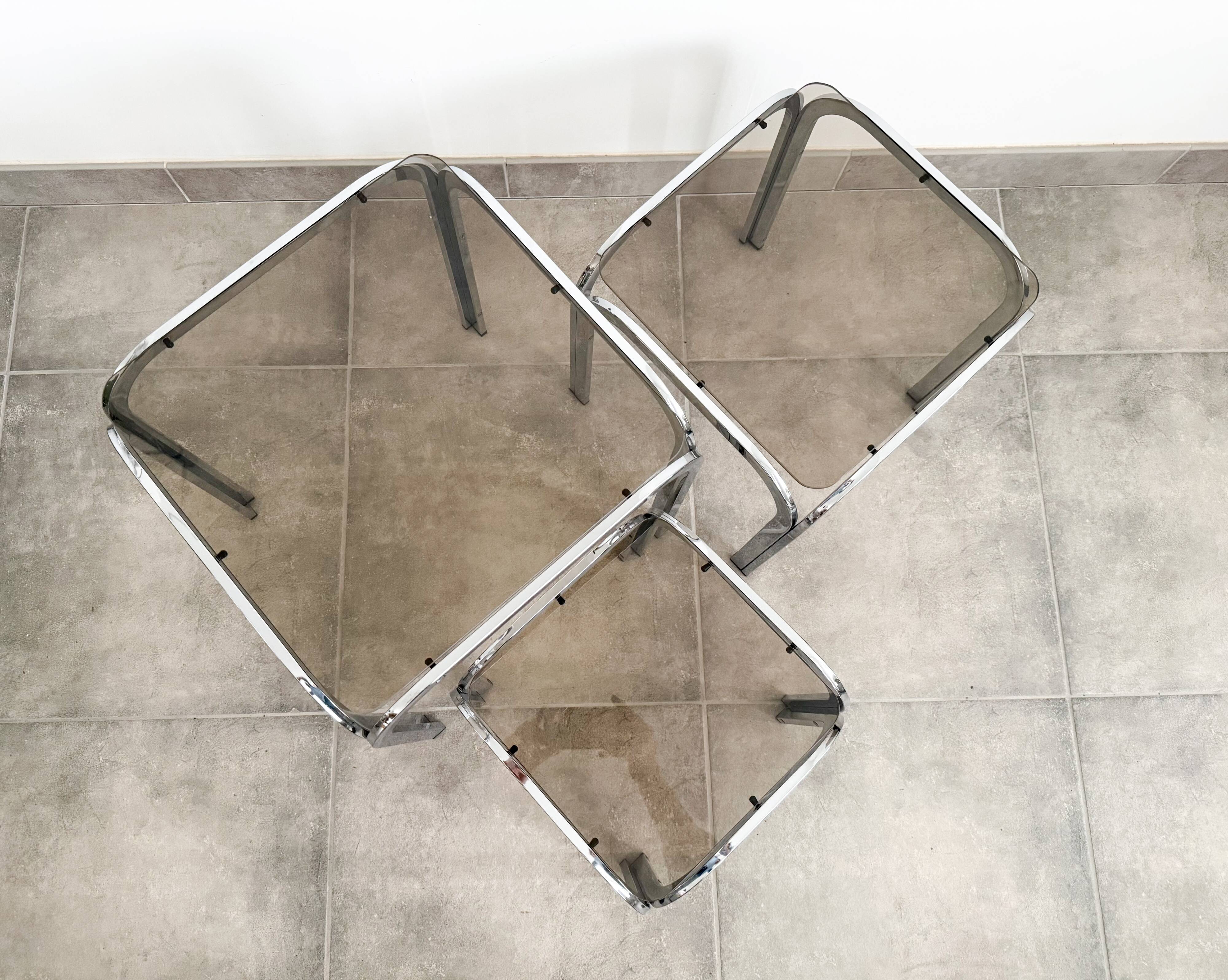 Set of 3 nesting tables, chrome and smoked glass, 1970s.