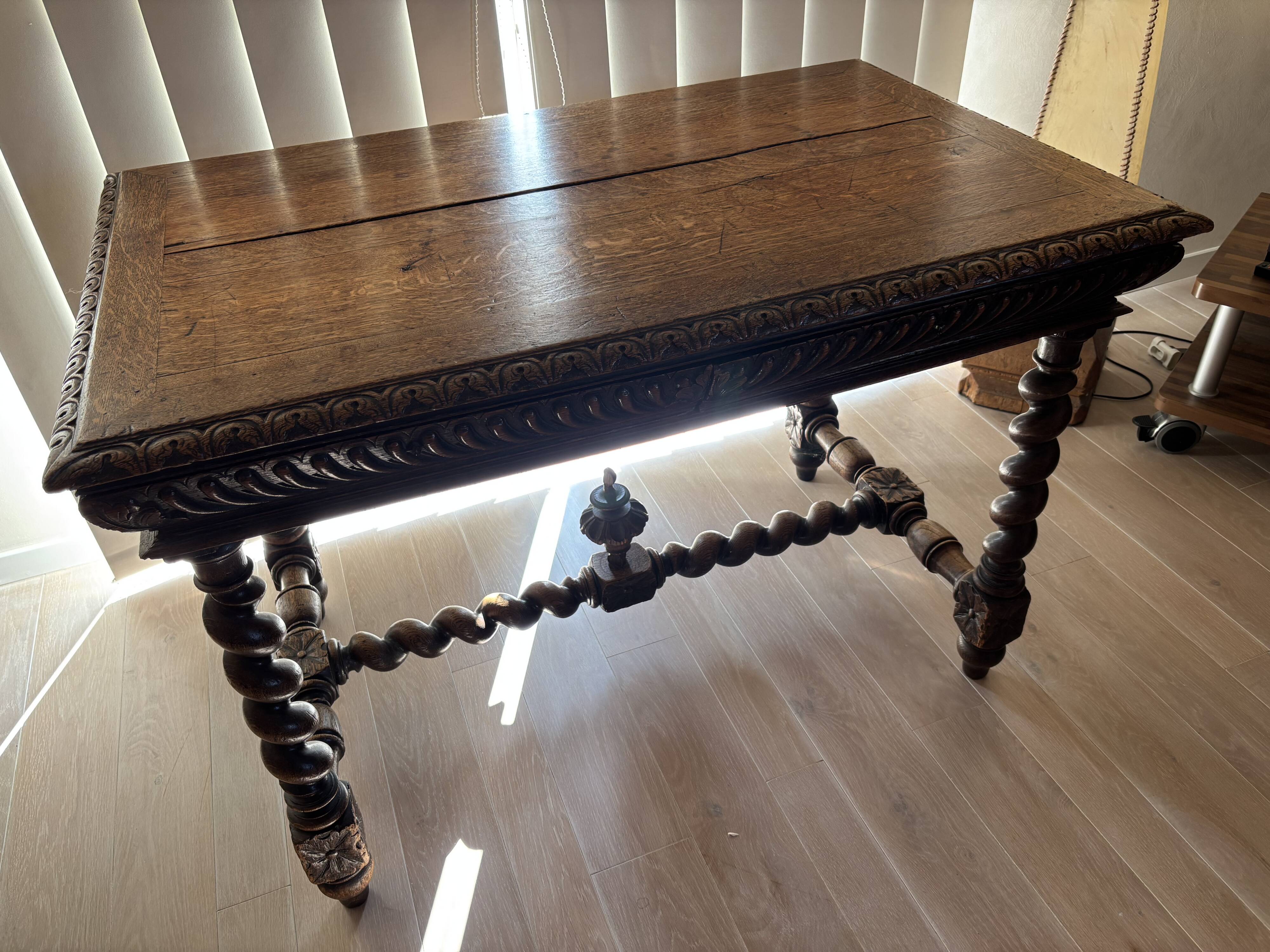 Louis XIII style desk in carved solid oak with twisted legs, late 19th century.