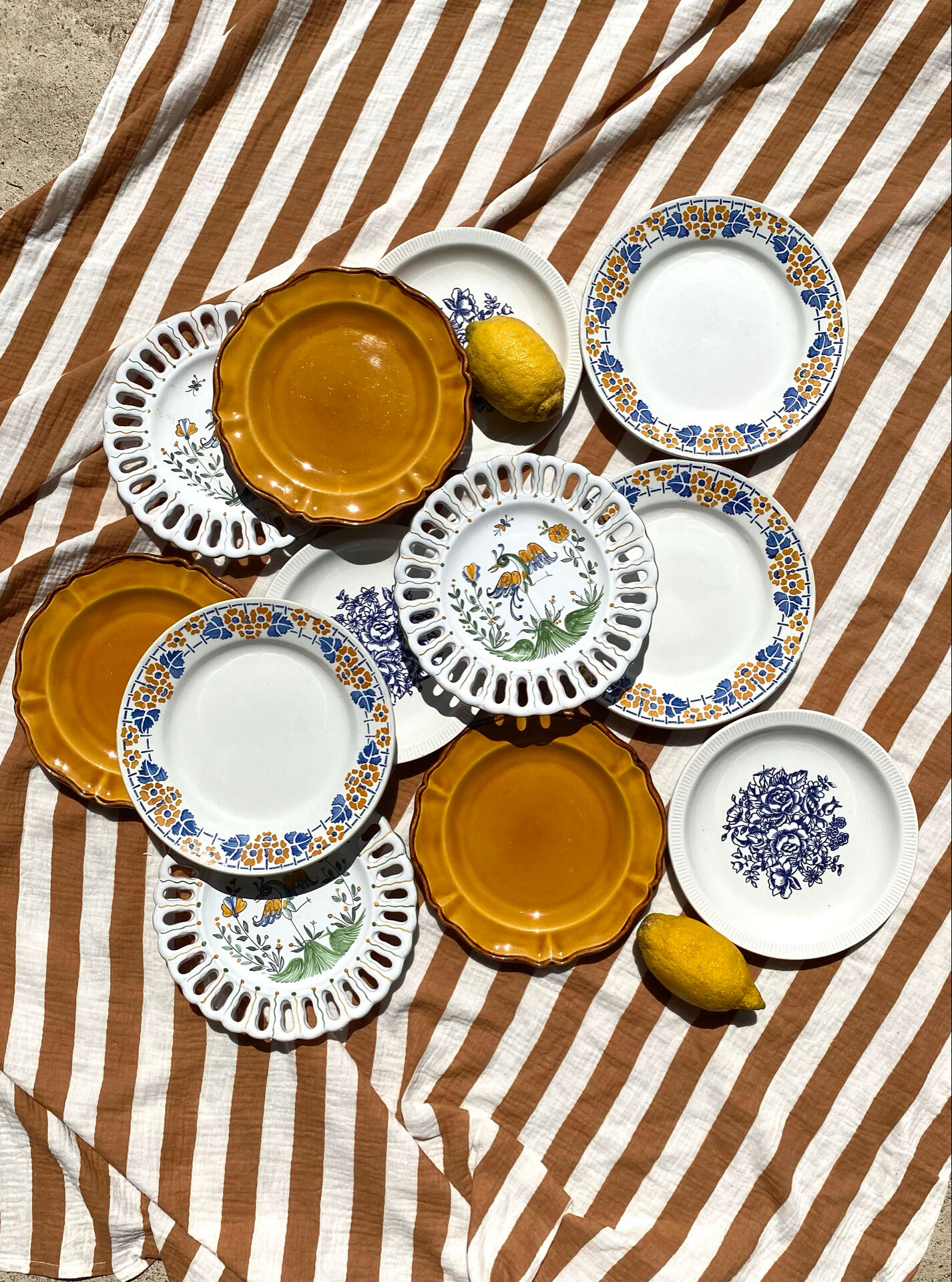 Set of twelve mismatched vintage dessert plates.