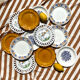 Set of twelve mismatched vintage dessert plates.