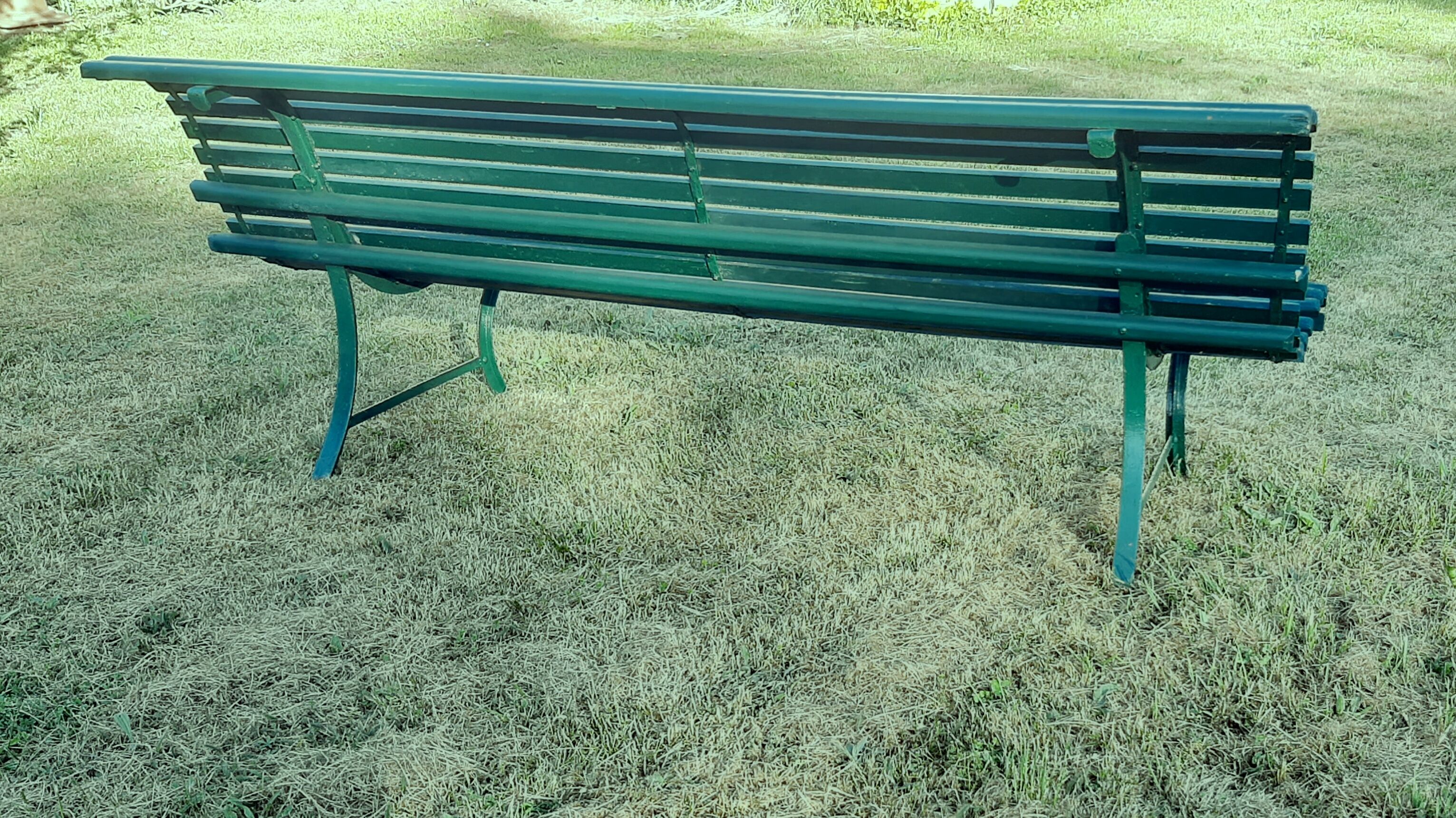 Garden bench with wooden and iron slats