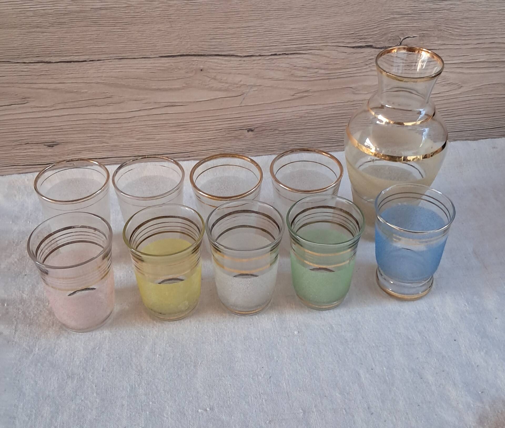 Vintage liqueur service from the 50s/60s — Decanter, 9 pastel glasses & tray