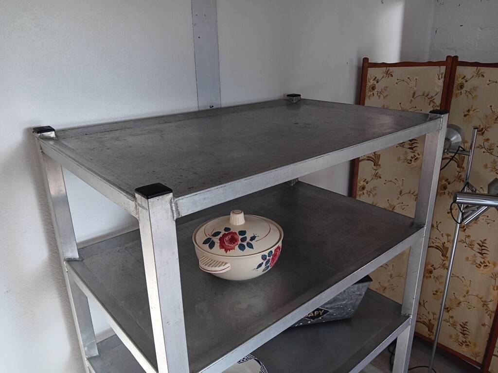 1950s metal shelf on wheels