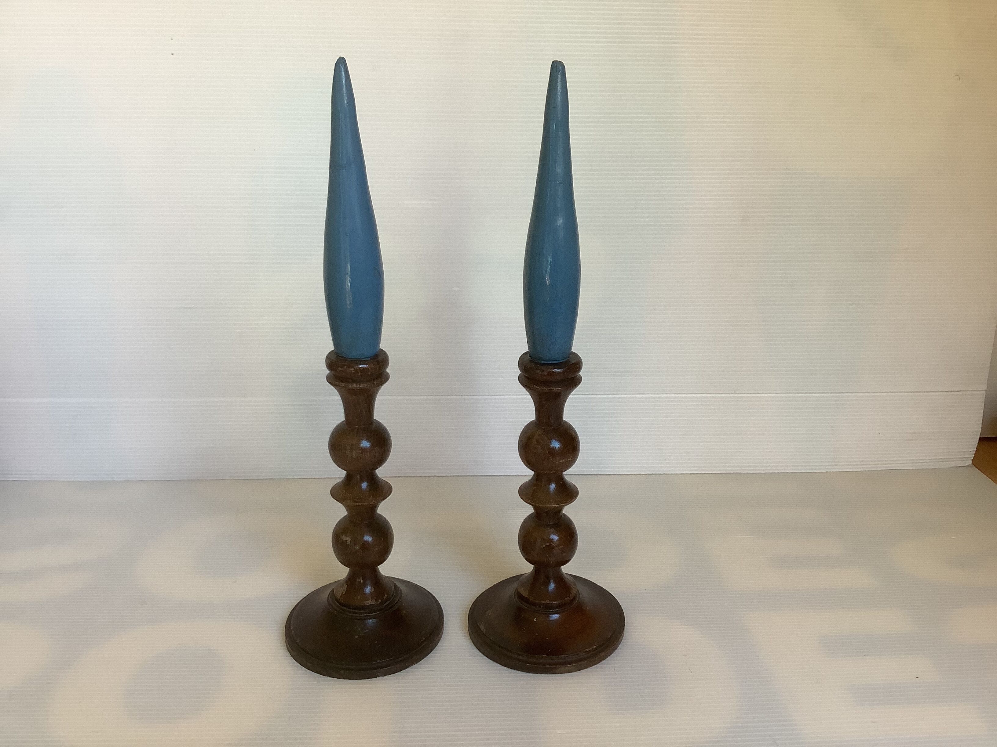 Pair of old candlesticks wood candles dummy blue wood