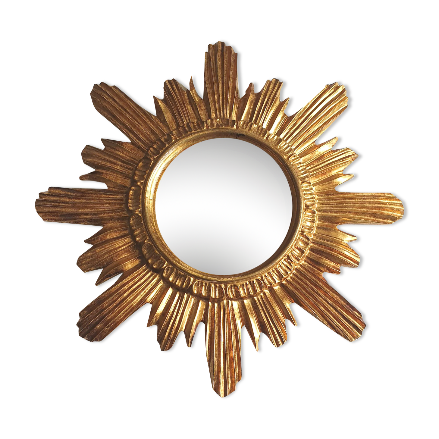 Sun mirror in gilded wood
