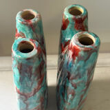 Vintage pair of turquoise and red ceramic candlesticks