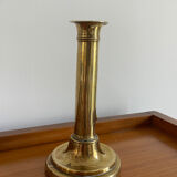 Old brass push candle holder