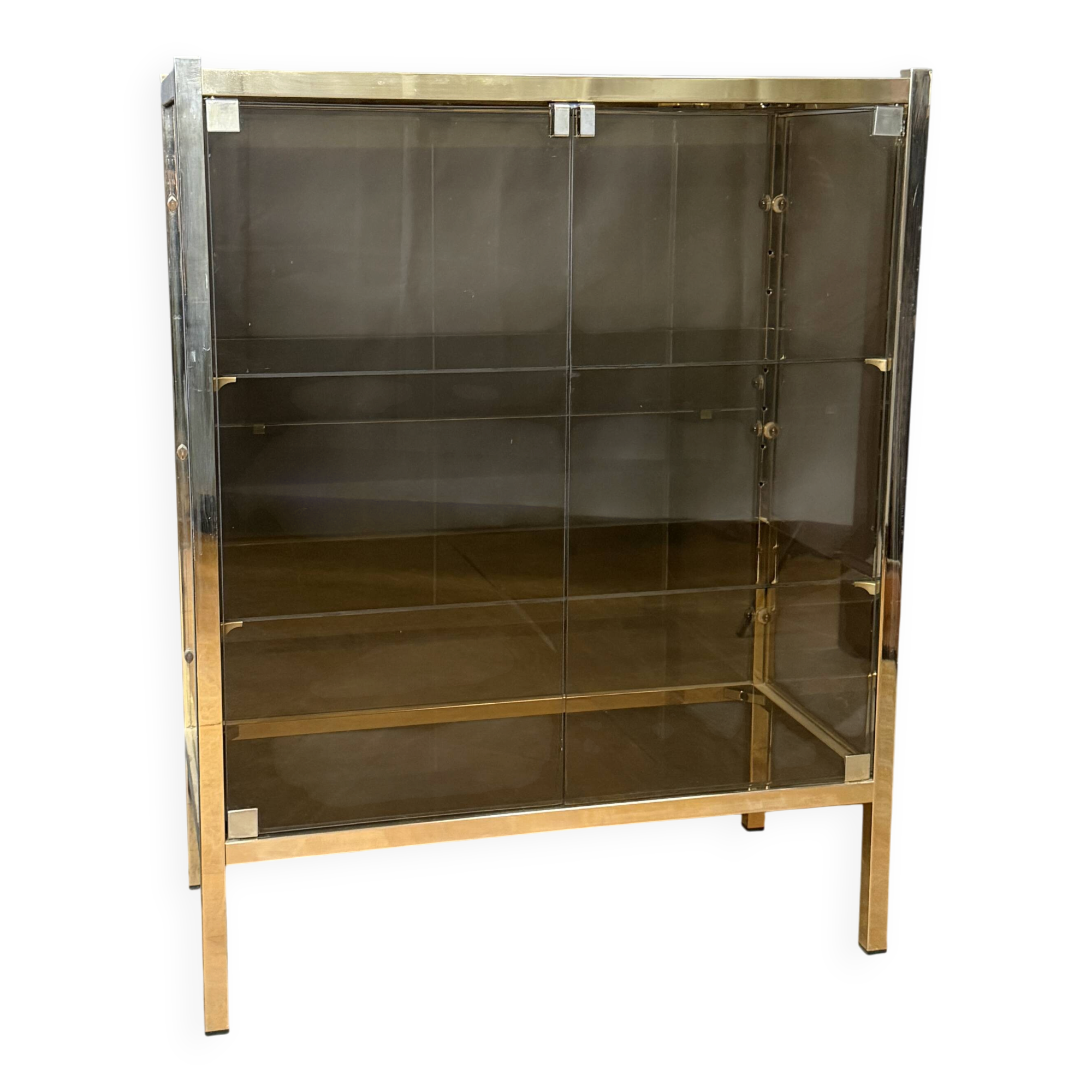 Chrome-plated brass display cabinet with smoked glass.