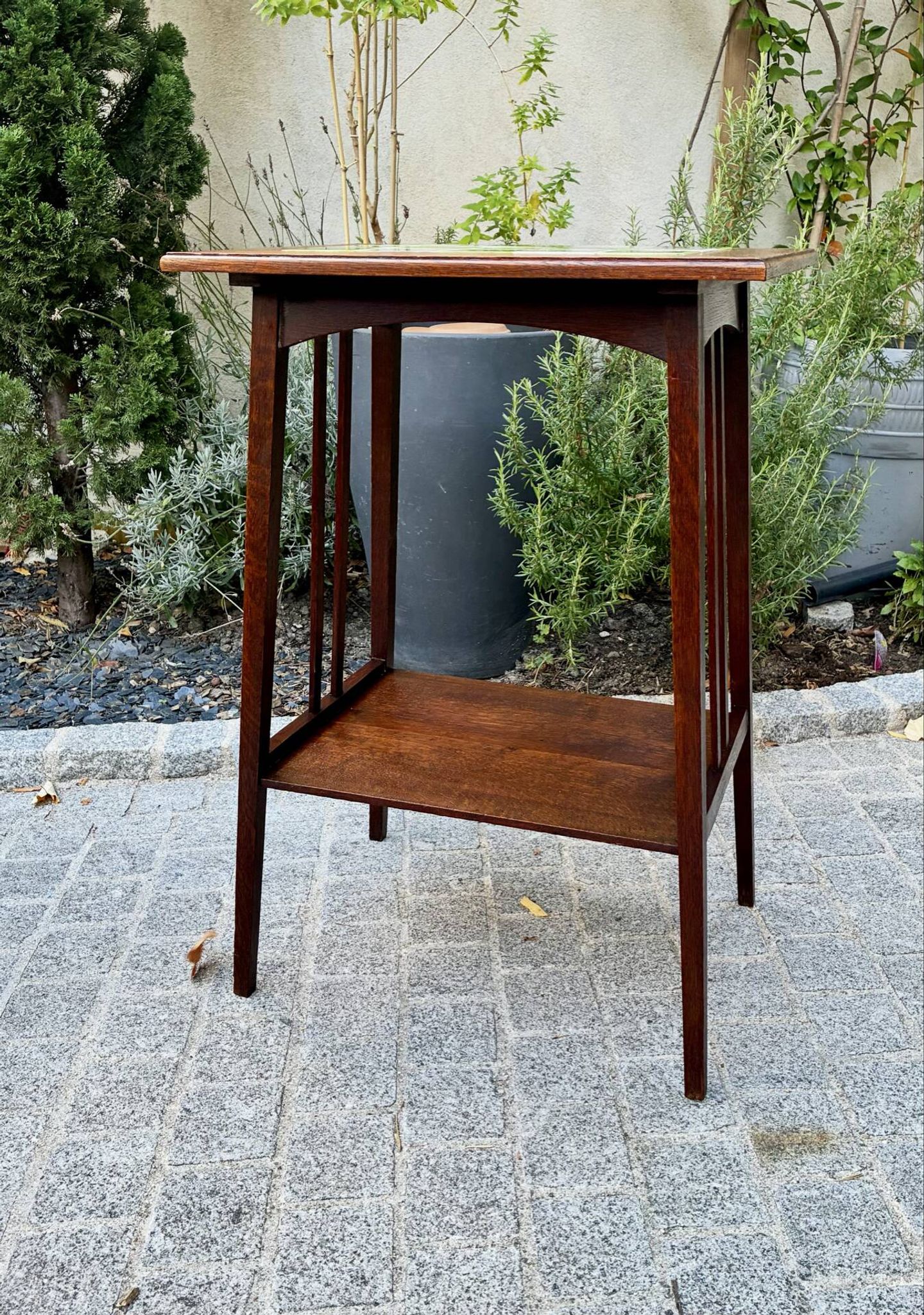 Art Nouveau side table 1910 with double tops in dark oak.