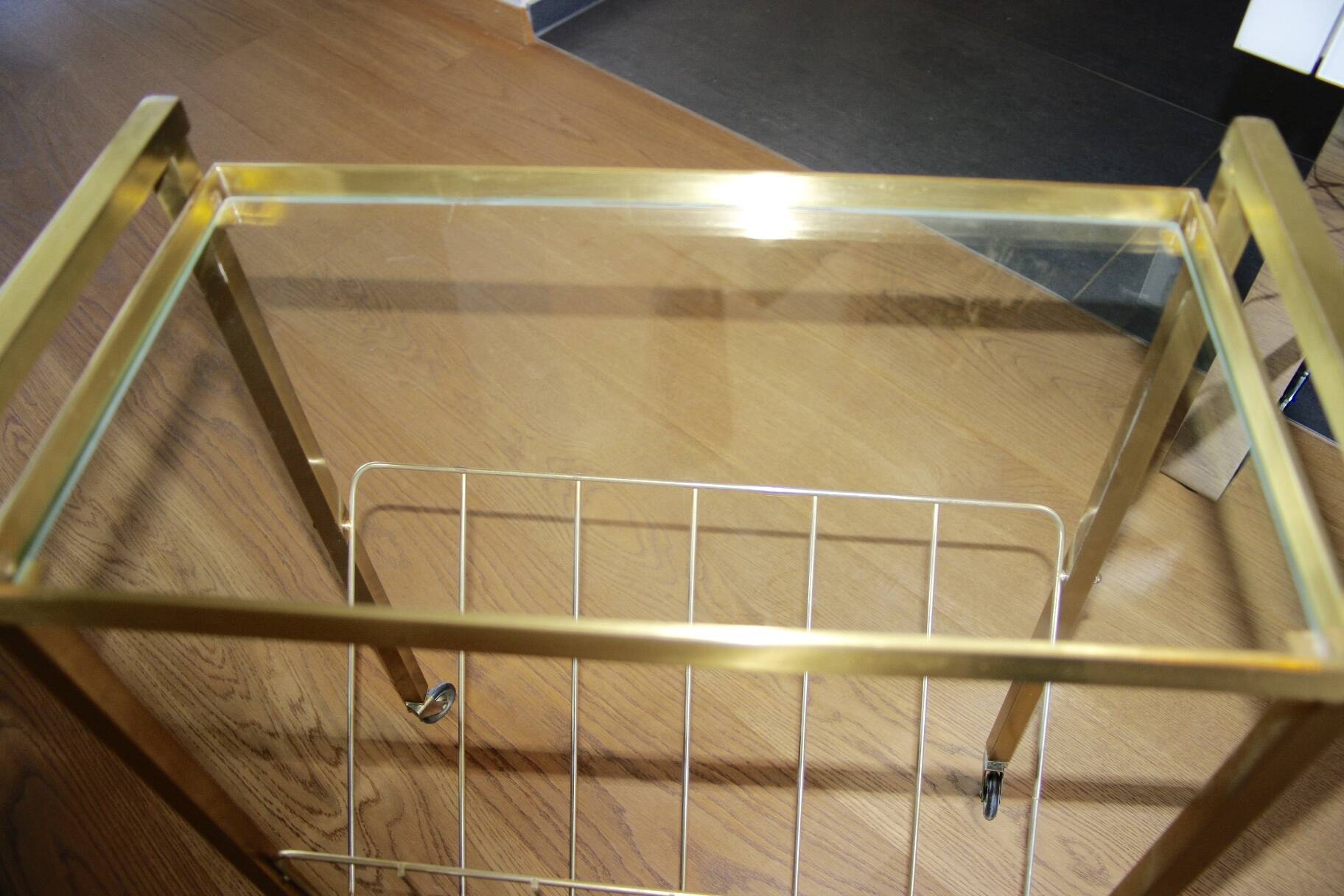 Vintage side table with brass and glass magazine rack