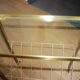 Vintage side table with brass and glass magazine rack