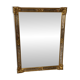 Large Deknudt mirror in gilded wood and glazing beads