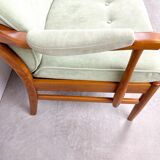 Two-seater sofa from the sixties with green upholstery