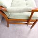 Two-seater sofa from the sixties with green upholstery