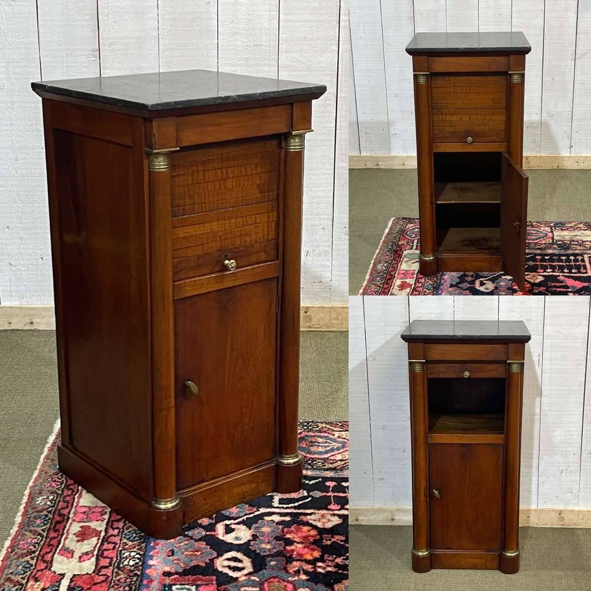 Empire bedside table from the 19th century in cherry wood and black marble.