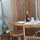 Salon rotin vintage et paravent