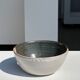White and glossy brown two-tone ceramic bowl, matt earth