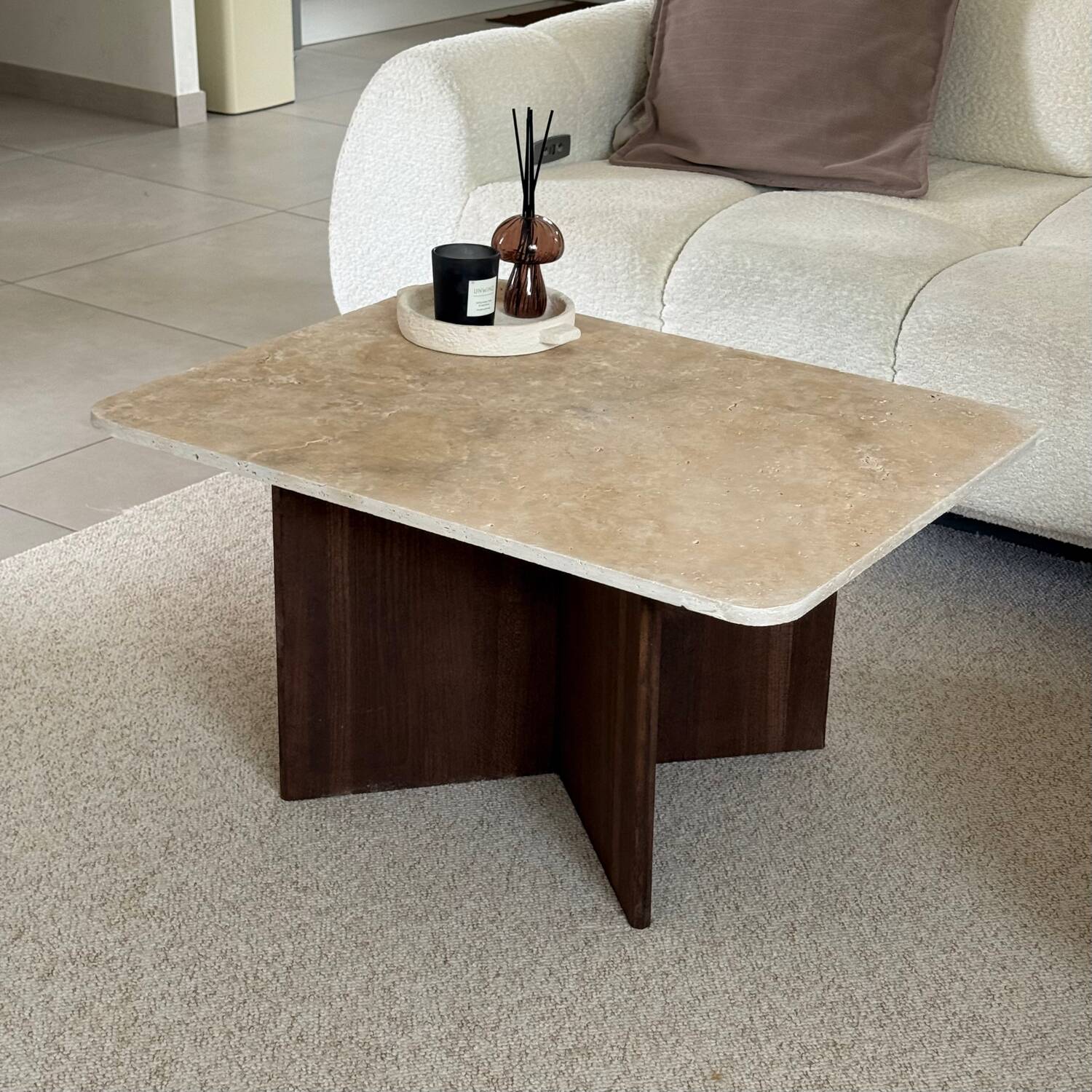 Rectangular coffee table in travertine and dark oak.