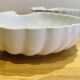 Shell-shaped plates. Scallop shell. Ceramic.