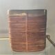 Rattan plant pot rimmed with brass from the 60s and 70s