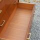 Vintage walnut varnished chest of drawers with 4 drawers from the 1960s.