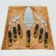 Art déco cake lifter and 6 cake forks black bakelite and lucite cake set