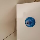 Polished in blue glass