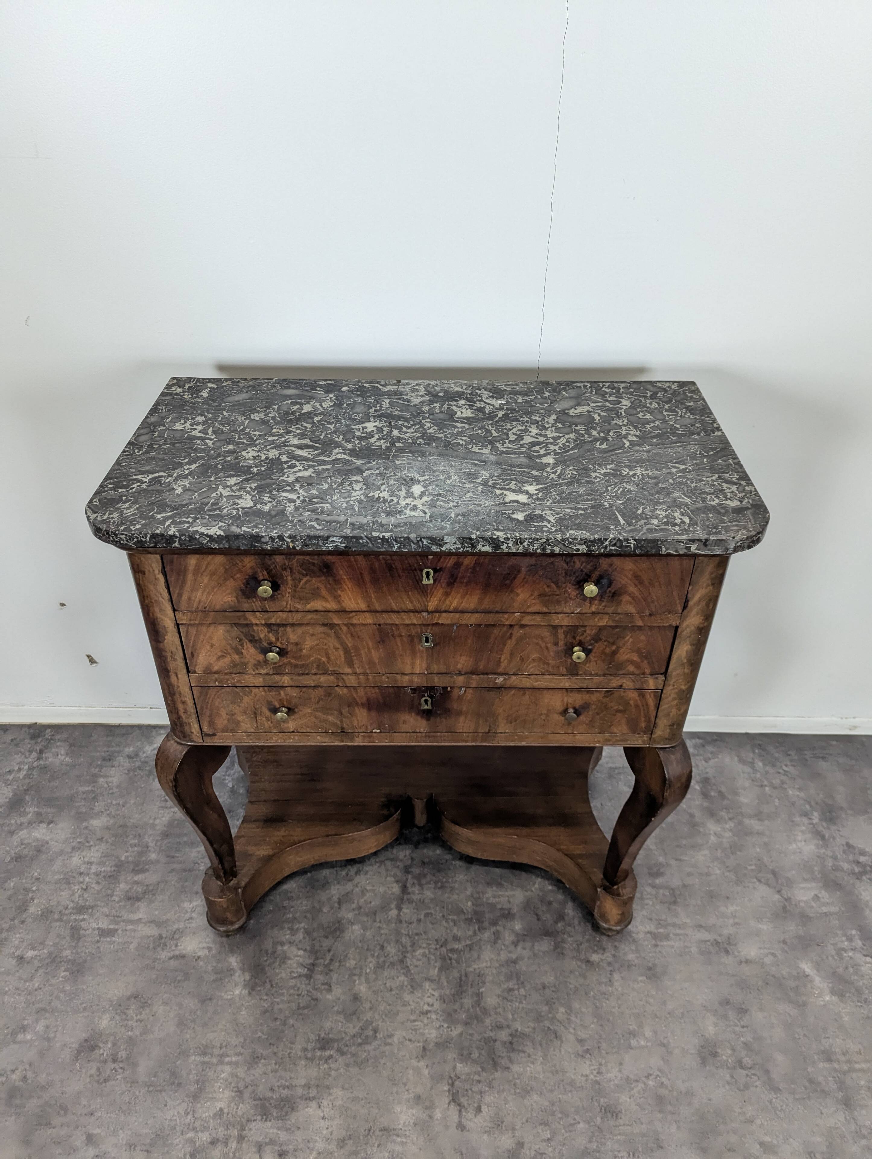 Louis Philippe period silver cabinet in flamed mahogany veneer