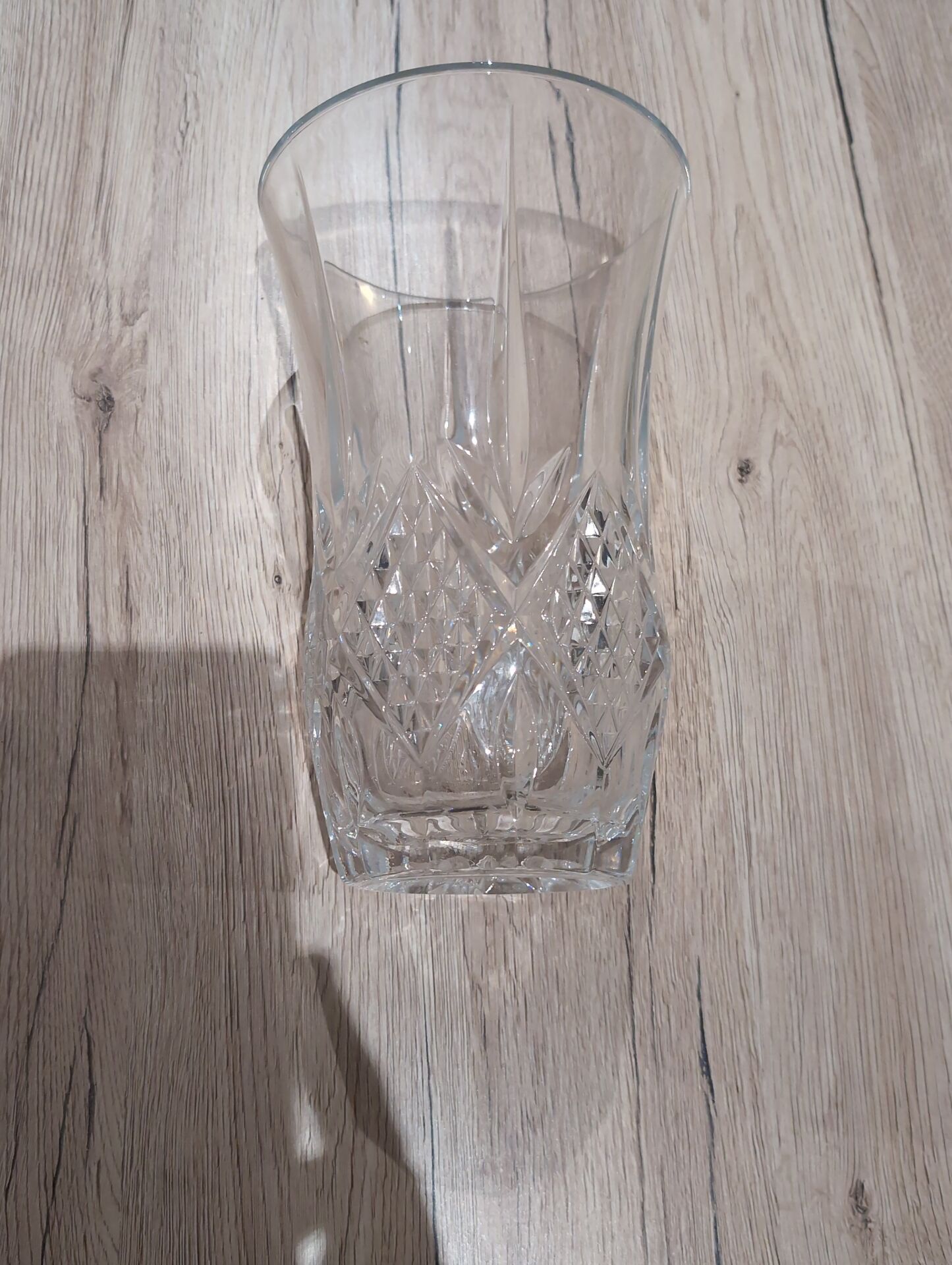 Vintage crystal vase with diamond cut points.