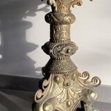 Large bronze candlestick with tripod and winged dog decoration, 19th century.