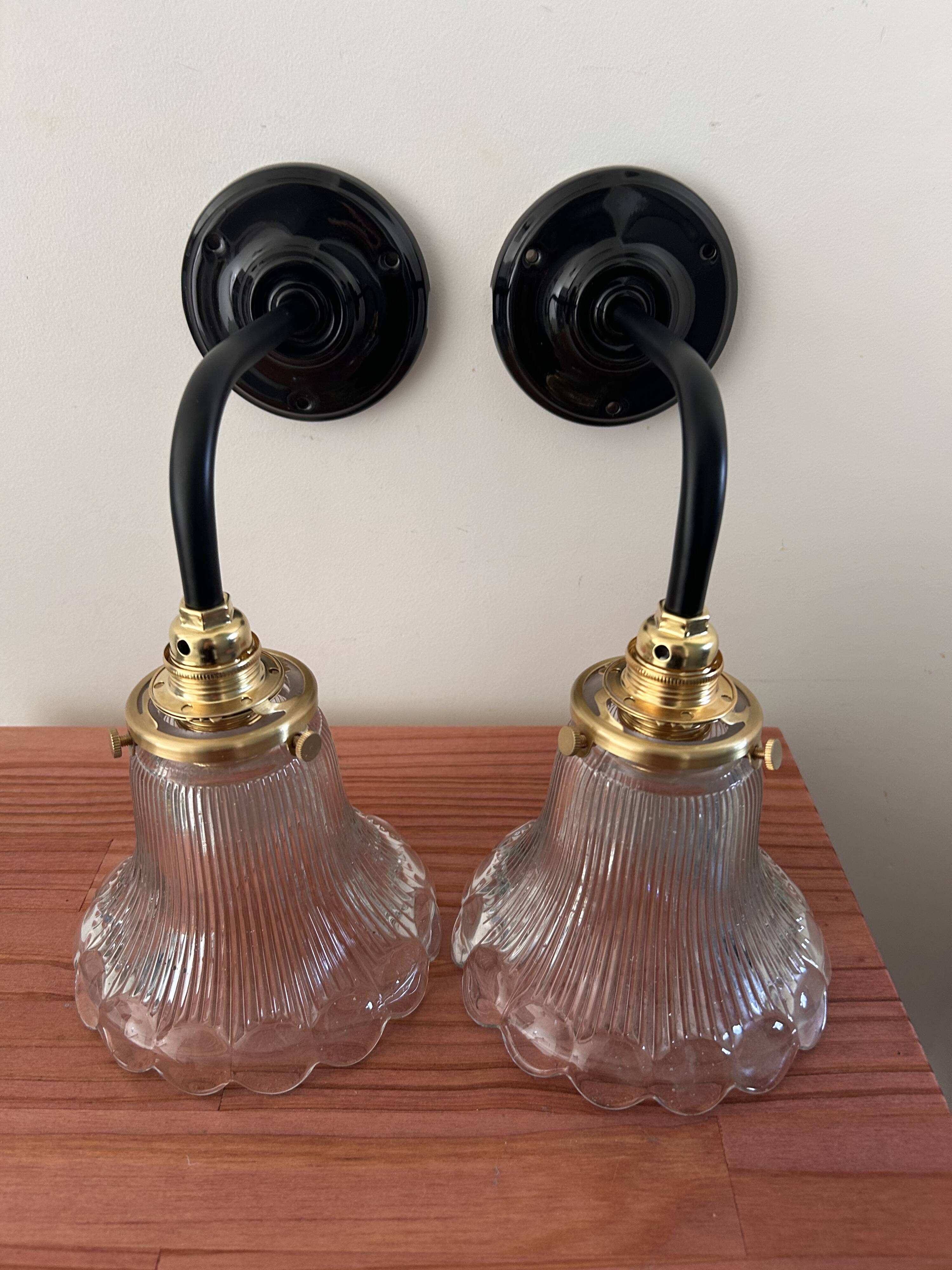 Pair of holophane glass wall lights