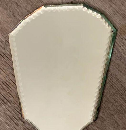 Vintage hand-facing mirror