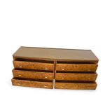 Veneered burl walnut chest of drawers with light warm brown glass top
