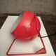 Table or wall lamp round in vintage red metal