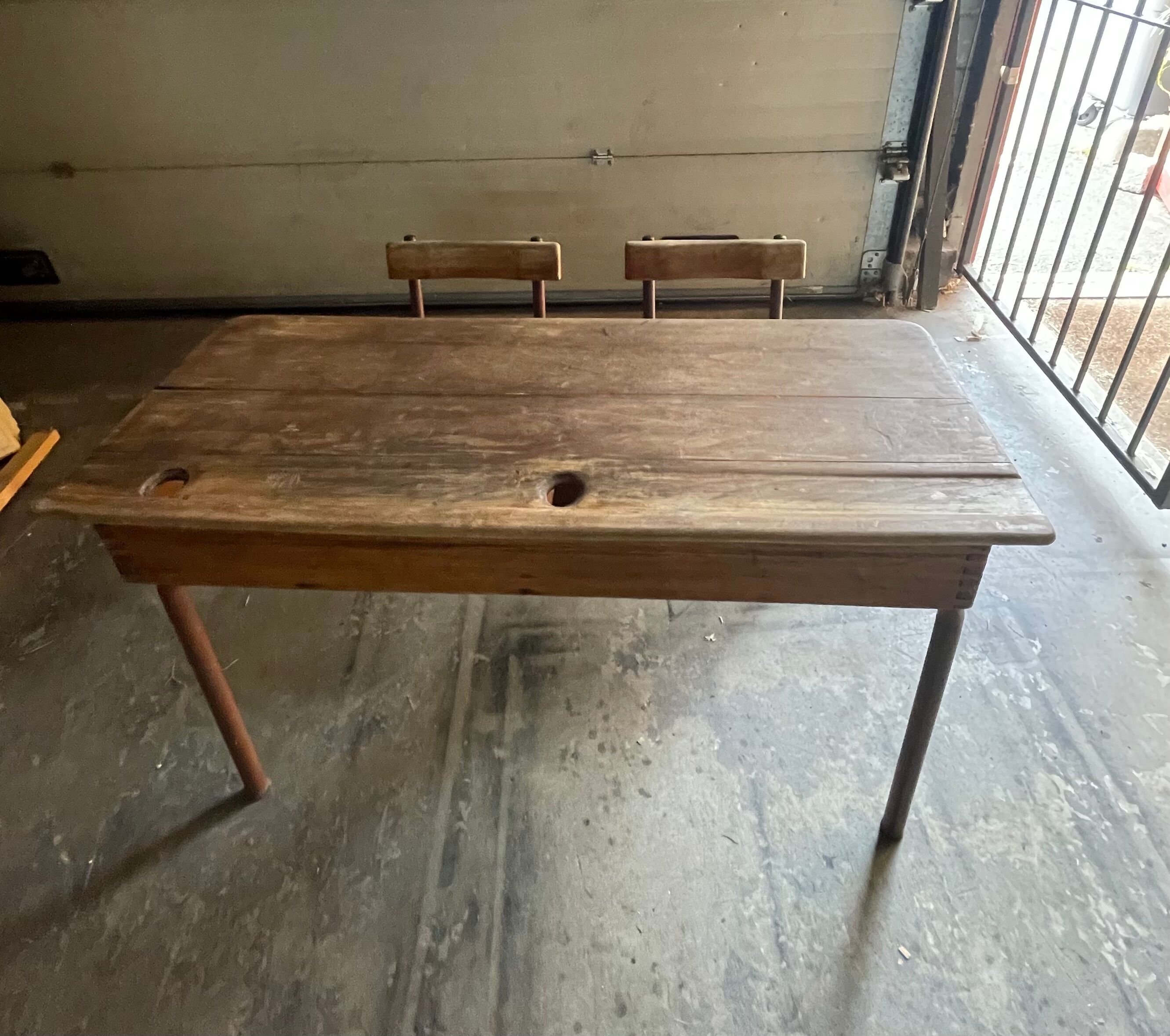 Double wooden desk and brown metal legs