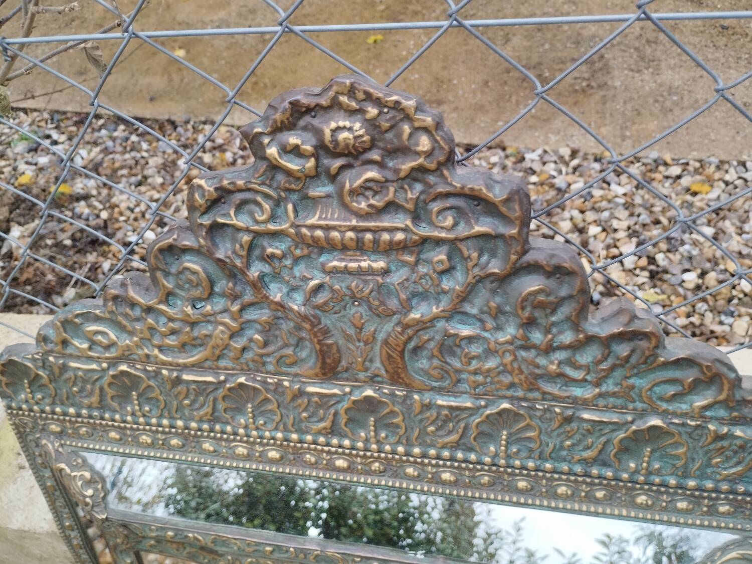 Antique mirror with copper moulding.