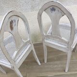 Pair of old white canne chairs