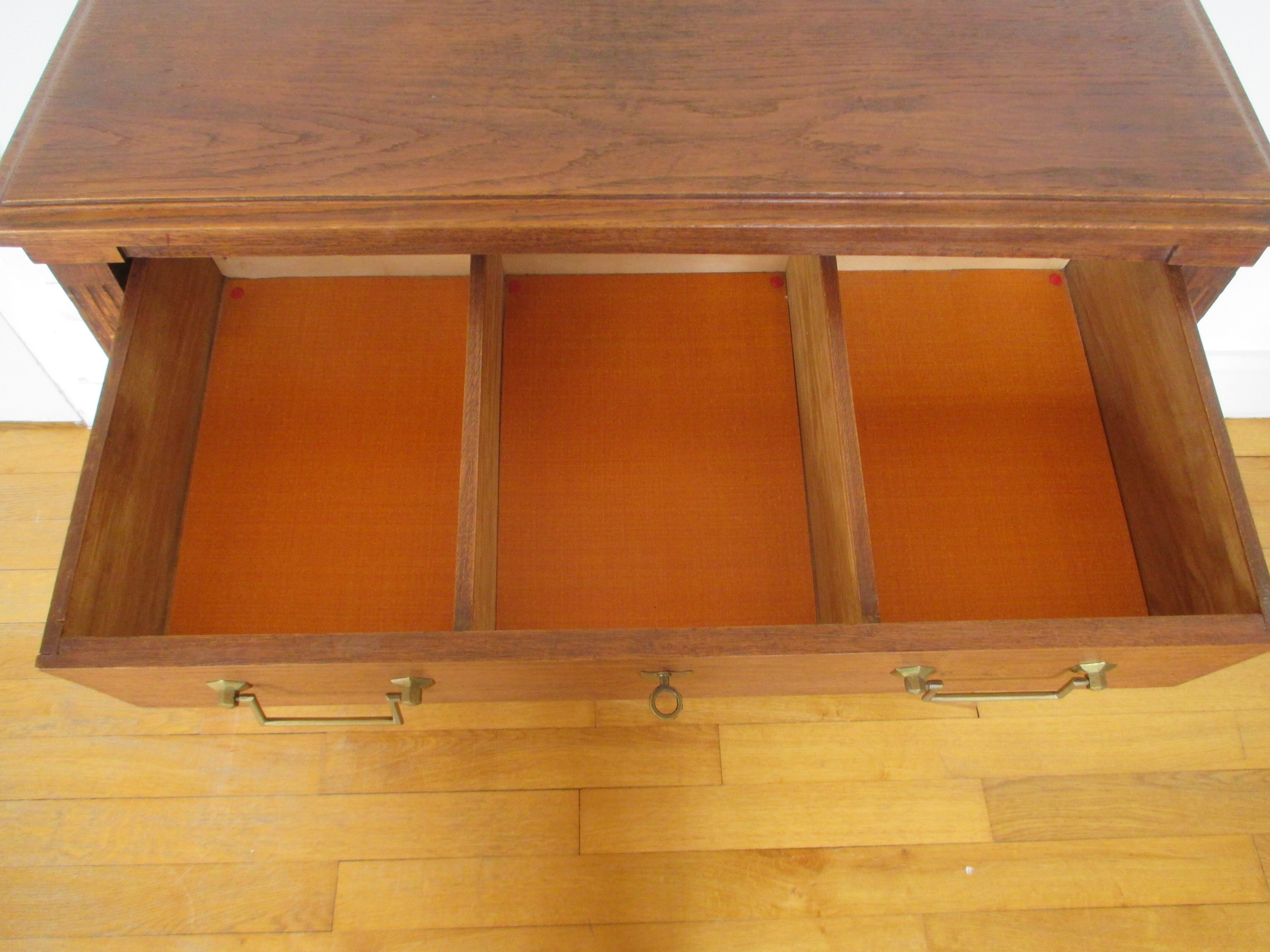 Oak chest of drawers and brass handles