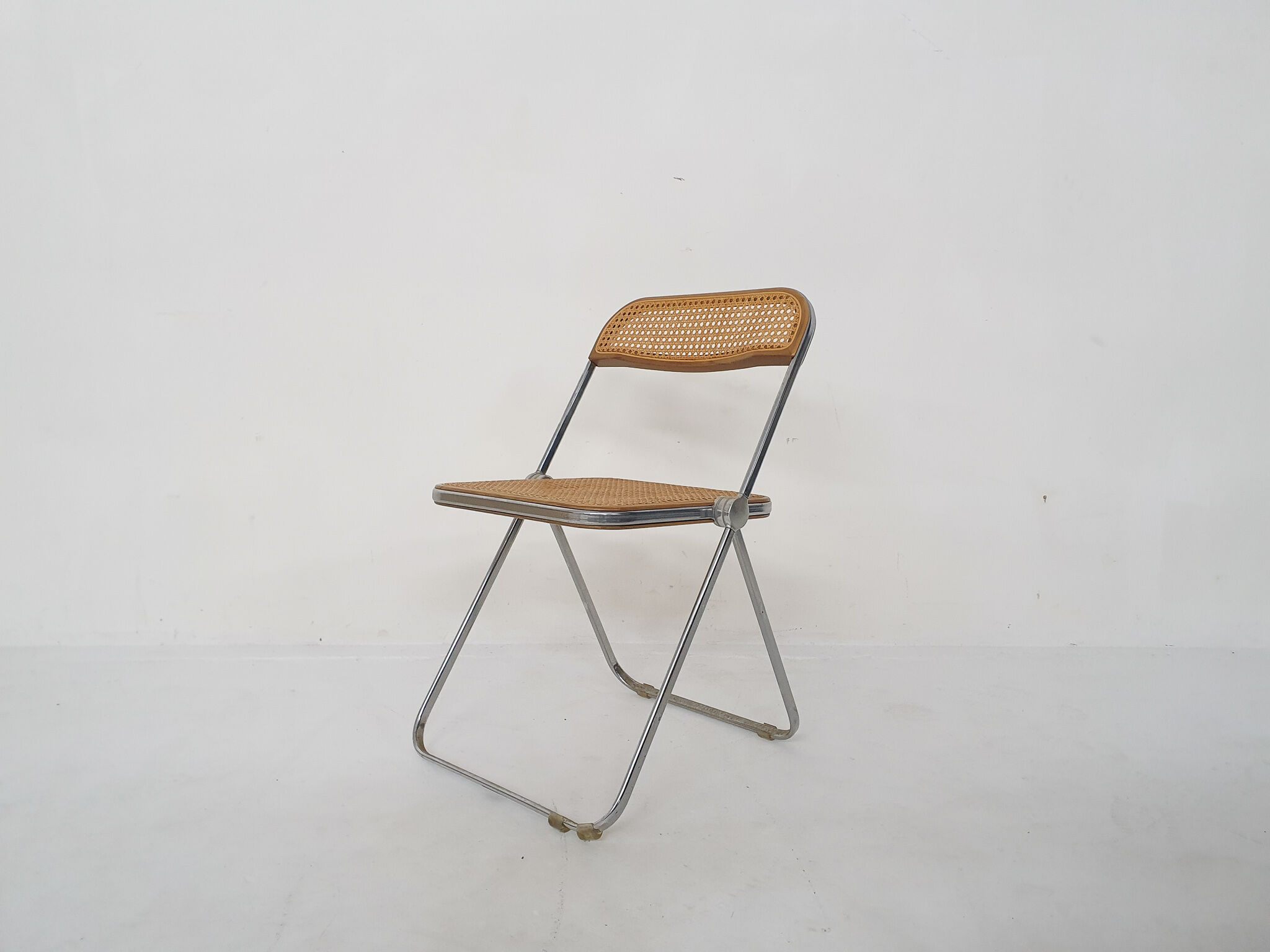 Webbing folding chair by Giancarlo Piretti for Castelli, model Plia, Italy 1967